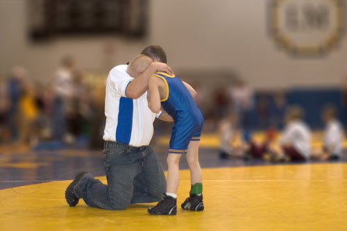 coach-comforting-crying-athlete_web